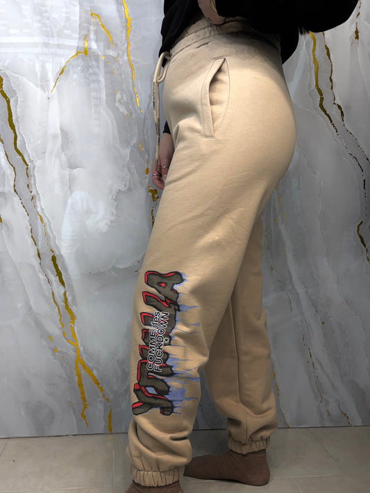 Pantatuta stampa font distorto COMME des FUCKDOWN